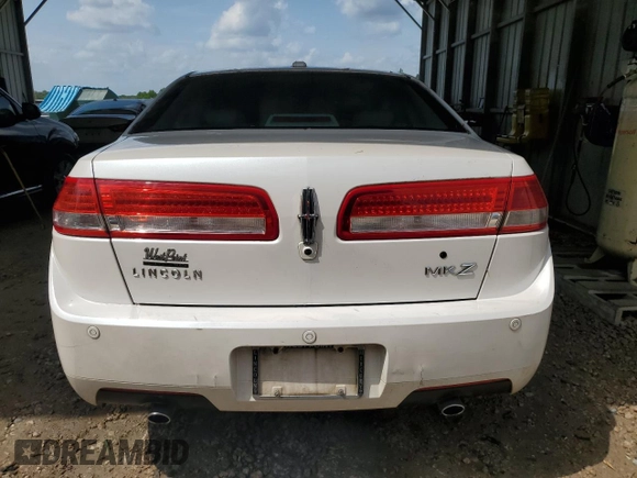 2010 Lincoln MKZ с VIN 3LNHL2GC2AR606886, выставлен на аукционе Copart как лот 54137715 с пробегом 77 393 миль миль и Списание • Salvage title. История ставок и продаж доступна на DreamBid. Изображение 6.
