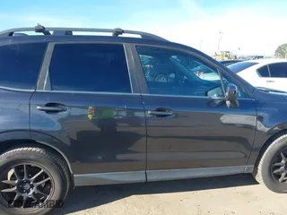 2016 Subaru Forester 2.0XT Premium with VIN JF2SJGDC5GH565148, listed as a IAAI auction lot 41226042 with 107,841 mi miles. Bid and sale history available at carsss.com. Image 13.