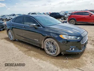 2013 Ford Fusion SE Hybrid with VIN 3FA6P0LU0DR267560, listed as a Copart auction lot 60563415 with 140,998 mi miles and Clean title. Bid and sale history available at DreamBid. Image 4.