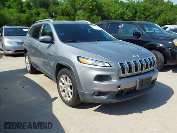2014 Jeep Cherokee Latitude with VIN 1C4PJMCB4EW315520, listed as a IAAI auction lot 42034989 with 215,758 mi miles and . Bid and sale history available at DreamBid. Image 1.