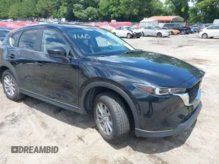 2023 Mazda CX-5 2.5 S Carbon Edition with VIN JM3KFBCMXP0201665, listed as a IAAI auction lot 39965378 with 29,105 mi miles. Bid and sale history available at carsss.com. Image 1.