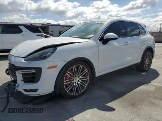 2015 Porsche Cayenne Turbo с VIN WP1AC2A29FLA80542, выставлен на аукционе Copart как лот 56620485 с пробегом Не указан миль и Списание • Salvage title. История ставок и продаж доступна на DreamBid. Изображение 1.