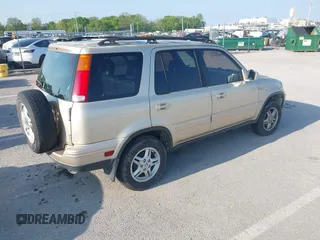 2000 Honda CR-V SE with VIN JHLRD1878YC048555, listed as a IAAI auction lot 42123556 with 164,934 mi miles. Bid and sale history available at carsss.com. Image 4.