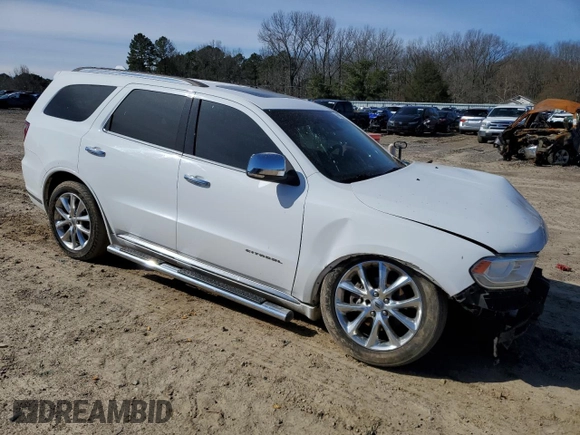 2019 Dodge Durango Citadel with VIN 1C4SDHET4KC806357, listed as a Copart auction lot 47949315 with 124,531 mi miles and Salvage Title. Bid and sale history available at DreamBid. Image 4.