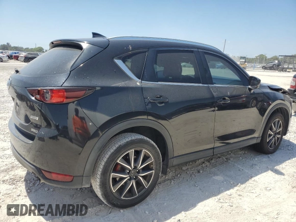 2018 Mazda CX-5 Touring with VIN JM3KFACM2J1327725, listed as a Copart auction lot 54894765 with 56,194 mi miles and Salvage Title. Bid and sale history available at carsss.com. Image 3.