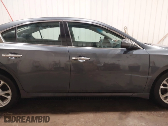 2013 Nissan Maxima SV with VIN 1N4AA5AP5DC801446, listed as a IAAI auction lot 41996092 with 124,823 mi miles and . Bid and sale history available at DreamBid. Image 14.