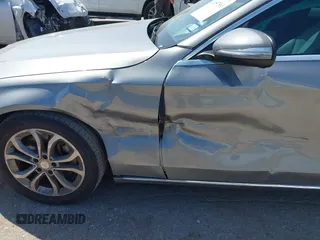 2015 Mercedes-Benz C 300 with VIN 55SWF4JB0FU056349, listed as a IAAI auction lot 41957561 with 74,764 mi miles and . Bid and sale history available at carsss.com. Image 6.