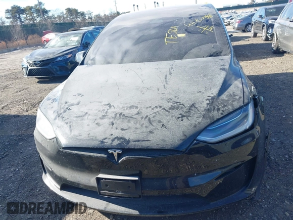 2023 Tesla Model X with VIN 7SAXCAE59PF377408, listed as a IAAI auction lot 41176738 with 32,496 mi miles and . Bid and sale history available at DreamBid. Image 12.