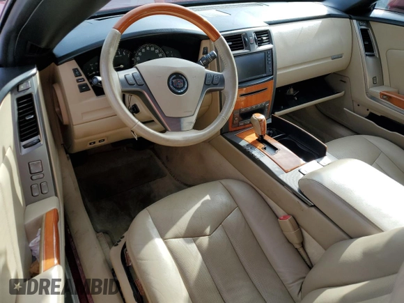2007 Cadillac XLR z VIN 1G6YV36A575601135, wystawiony jako Copart lot #75123444 z przebiegiem Nie podano mil oraz Szkody całkowita. Historia ofert i sprzedaży dostępna na DreamBid. Obrazek 8.
