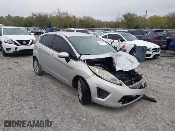 2013 Ford Fiesta SE with VIN 3FADP4EJ6DM107293, listed as a IAAI auction lot 41898229 with 129,694 mi miles. Bid and sale history available at carsss.com. Image 1.