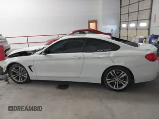 2015 BMW 4 Series 435i с VIN WBA3R1C50FK193678, выставлен на аукционе IAAI как лот 41603410 с пробегом 118 318 миль миль и . История ставок и продаж доступна на DreamBid. Изображение 14.