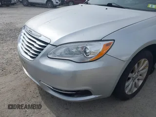 2012 Chrysler 200 Touring with VIN 1C3CCBBB7CN125569, listed as a IAAI auction lot 42083043 with 188,461 mi miles. Bid and sale history available at carsss.com. Image 6.