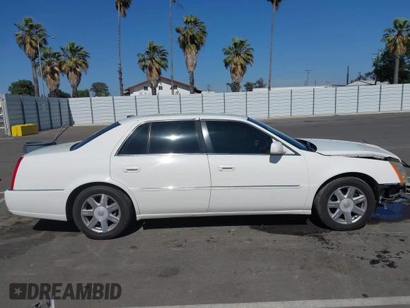 2007 Cadillac DTS Luxury I z VIN 1G6KD57Y77U133267, wystawiony jako IAAI lot #42337188 z przebiegiem 126 063 mil mil oraz . Historia ofert i sprzedaży dostępna na DreamBid. Obrazek 14.