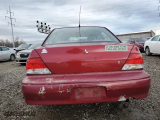2002 Mitsubishi Lancer ES with VIN JA3AJ26E62U053845, listed as a Copart auction lot 86657704 with 213,276 mi miles and Salvage Title. Bid and sale history available at carsss.com. Image 6.