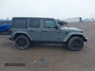 2023 Jeep Wrangler Sahara with VIN 1C4JJXP6XPW698886, listed as a IAAI auction lot 42439690 with 41,787 mi miles and . Bid and sale history available at DreamBid. Image 13.