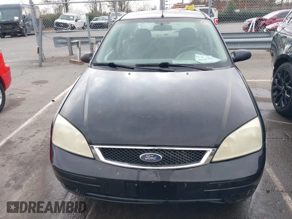 2005 Ford Focus S with VIN 1FAFP34N75W304479, listed as a IAAI auction lot 41117405 with 234,312 mi miles. Bid and sale history available at carsss.com. Image 6.
