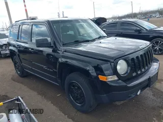 2014 Jeep Patriot Sport with VIN 1C4NJPBA4ED844253, listed as a IAAI auction lot 41879323 with 170,551 mi miles. Bid and sale history available at carsss.com. Image 1.