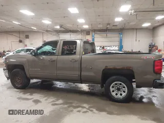 2015 Chevrolet Silverado 1500 LT with VIN 1GCVKREC6FZ183559, listed as a IAAI auction lot 41813921 with 171,304 mi miles and . Bid and sale history available at DreamBid. Image 14.