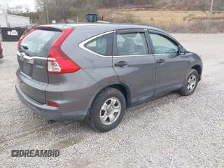 2015 Honda CR-V LX with VIN 2HKRM4H33FH617583, listed as a IAAI auction lot 41805272 with 88,214 mi miles and . Bid and sale history available at DreamBid. Image 4.