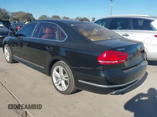 2014 Volkswagen Passat SEL Premium with VIN 1VWCS7A39EC080409, listed as a IAAI auction lot 40917278 with 140,783 mi miles. Bid and sale history available at carsss.com. Image 3.