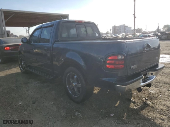2002 Ford F-150 XLT with VIN 1FTRW07LX2KC22722, listed as a Copart auction lot 46000825 with 270,945 mi miles and Salvage Title. Bid and sale history available at carsss.com. Image 2.