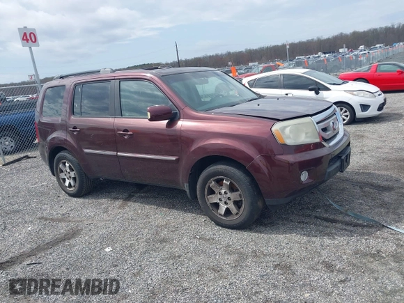 2010 Honda Pilot Touring with VIN 5FNYF4H95AB040721, listed as a IAAI auction lot 41928412 with 213,219 mi miles and . Bid and sale history available at carsss.com. Image 13.