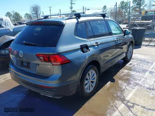 2018 Volkswagen Tiguan S with VIN 3VV1B7AX3JM058106, listed as a IAAI auction lot 41733458 with 164,268 mi miles. Bid and sale history available at carsss.com. Image 4.