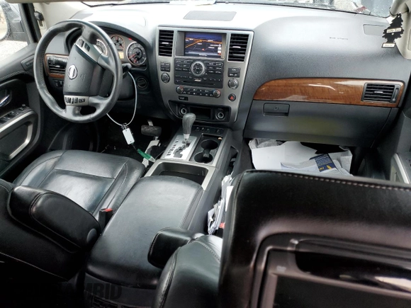 2015 Nissan Armada Platinum z VIN 5N1BA0NF6FN617932, wystawiony jako Copart lot #48202355 z przebiegiem 101 219 mil mil oraz Szkoda całkowita • Salvage title. Historia ofert i sprzedaży dostępna na DreamBid. Obrazek 8.