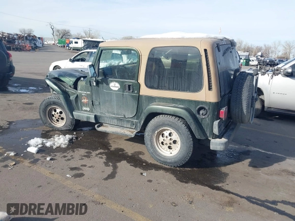 1998 Jeep Wrangler Sahara z VIN 1J4FY49S3WP744619, wystawiony jako IAAI lot #41107702 z przebiegiem 105 432 mil mil oraz . Historia ofert i sprzedaży dostępna na DreamBid. Obrazek 3.