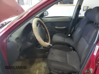 1999 Hyundai Accent z VIN KMHVF24N5XU575750, wystawiony jako Copart lot #52190805 z przebiegiem 205 655 mil mil oraz Tytuł czysty. Historia ofert i sprzedaży dostępna na DreamBid. Obrazek 7.
