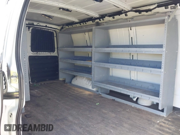 2017 Chevrolet Express Cargo Van with VIN 1GCWGBFF1H1102247, listed as a IAAI auction lot 40660637 with 105,126 mi miles. Bid and sale history available at carsss.com. Image 8.