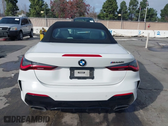 2022 BMW 4 Series M440i with VIN WBA53AT02NCJ20674, listed as a IAAI auction lot 41200398 with 28,235 mi miles and . Bid and sale history available at DreamBid. Image 17.