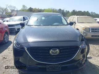 2023 Mazda CX-9 Touring Plus with VIN JM3TCBAY9P0657854, listed as a IAAI auction lot 41931409 with 54,036 mi miles and . Bid and sale history available at DreamBid. Image 12.