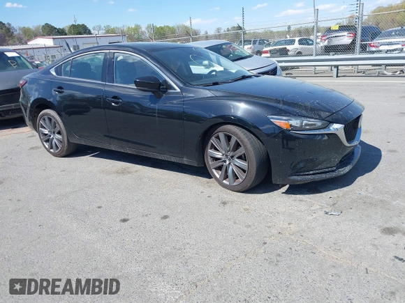 2018 Mazda Mazda6 Touring with VIN JM1GL1VM2J1308743, listed as a IAAI auction lot 41872947 with 125,236 mi miles. Bid and sale history available at carsss.com. Image 1.