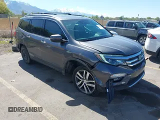 2018 Honda Pilot Elite with VIN 5FNYF6H09JB049628, listed as a IAAI auction lot 42137444 with 108,444 mi miles and . Bid and sale history available at DreamBid. Image 1.