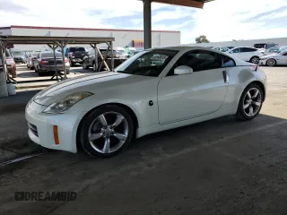 2006 Nissan 350Z Touring z VIN JN1AZ34D66M330951, wystawiony jako Copart lot #52898615 z przebiegiem 68 888 mil mil oraz Nie do naprawy. Historia ofert i sprzedaży dostępna na DreamBid. Obrazek 1.