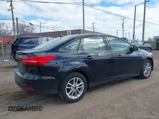 2017 Ford Focus SE with VIN 1FADP3F2XHL263071, listed as a IAAI auction lot 42046106 with 91,633 mi miles and . Bid and sale history available at DreamBid. Image 4.