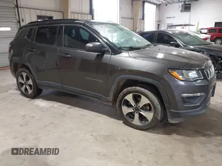 2018 Jeep Compass Latitude with VIN 3C4NJDBB9JT116391, listed as a IAAI auction lot 41953729 with 129,331 mi miles and . Bid and sale history available at DreamBid. Image 1.