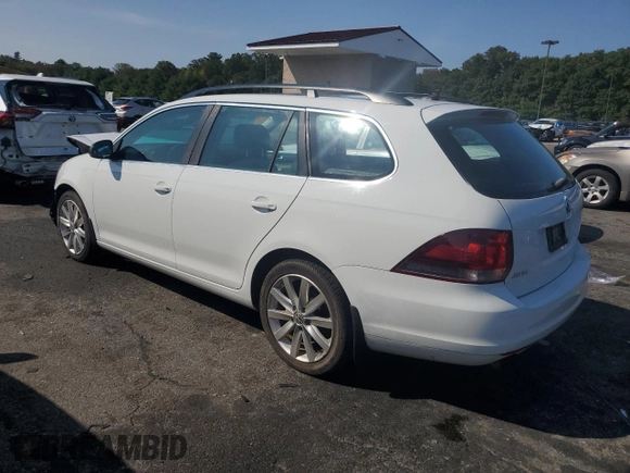 2014 Volkswagen Jetta SportWagen TDI w/Sunroof with VIN 3VWML7AJ8EM615728, listed as a Copart auction lot 71361764 with 84,988 mi miles and Salvage Title. Bid and sale history available at carsss.com. Image 2.