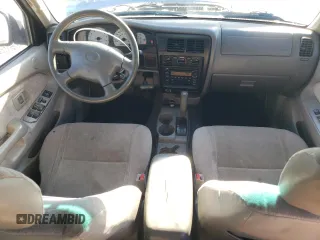 2003 Toyota Tacoma PreRunner z VIN 5TEGM92N33Z215411, wystawiony jako Copart lot #49573225 z przebiegiem 255 517 mil mil oraz Czysty tytuł • Clean title. Historia ofert i sprzedaży dostępna na DreamBid. Obrazek 8.