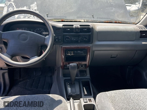 2002 Isuzu Rodeo S z VIN 4S2CK58W124324362, wystawiony jako Copart lot #49668045 z przebiegiem Nie podano mil oraz Czysty tytuł • Clean title. Historia ofert i sprzedaży dostępna na DreamBid. Obrazek 9.
