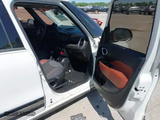 2014 FIAT 500L Trekking with VIN ZFBCFADH2EZ007586, listed as a IAAI auction lot 42040589 with 69,793 mi miles. Bid and sale history available at carsss.com. Image 5.
