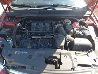 2014 Ford Taurus SEL with VIN 1FAHP2E86EG186642, listed as a IAAI auction lot 41901768 with 106,057 mi miles. Bid and sale history available at carsss.com. Image 10.