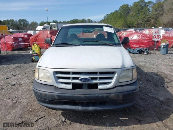 1999 Ford F-150 Work Series with VIN 1FTZF1726XNB58407, listed as a IAAI auction lot 41753826 with 180,172 mi miles. Bid and sale history available at carsss.com. Image 12.