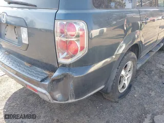 2006 Honda Pilot EX-L with RES with VIN 5FNYF28636B021196, listed as a IAAI auction lot 41461805 with 328,491 mi miles. Bid and sale history available at carsss.com. Image 6.