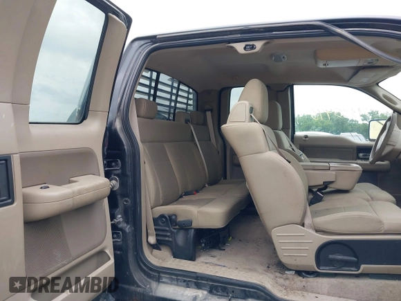 2007 Ford F-150 XLT with VIN 1FTPX14V07KC69605, listed as a IAAI auction lot 39335496 with 125,447 mi miles. Bid and sale history available at carsss.com. Image 8.