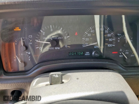 1999 Jeep Cherokee Sport с VIN 1J4FT68S5XL675839, выставлен на аукционе Copart как лот 65230005 с пробегом 204 102 миль миль и Списание • Salvage title. История ставок и продаж доступна на DreamBid. Изображение 9.