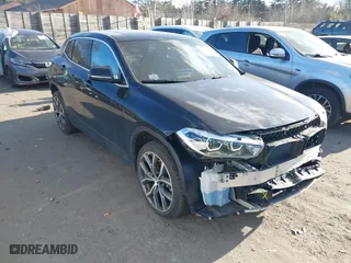 2022 BMW X2 xDrive28i with VIN WBXYJ1C00N5U75582, listed as a IAAI auction lot 41251978 with 44,851 mi miles. Bid and sale history available at carsss.com. Image 1.