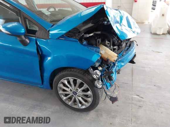 2014 Ford Fiesta SE with VIN 3FADP4EJ7EM204438, listed as a IAAI auction lot 42098291 with 184,930 mi miles and . Bid and sale history available at DreamBid. Image 6.