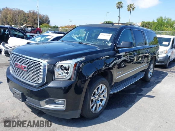 2015 GMC Yukon XL Denali with VIN 1GKS1JKJ1FR134428, listed as a IAAI auction lot 42149588 with 116,207 mi miles. Bid and sale history available at carsss.com. Image 6.
